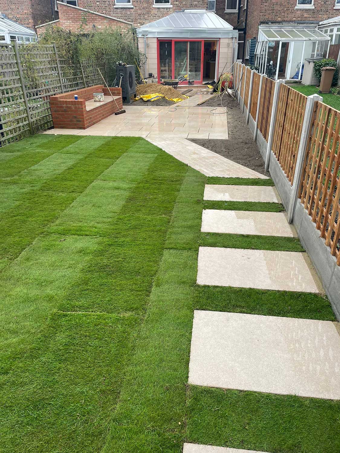 Lawn with stepping stones & fencing