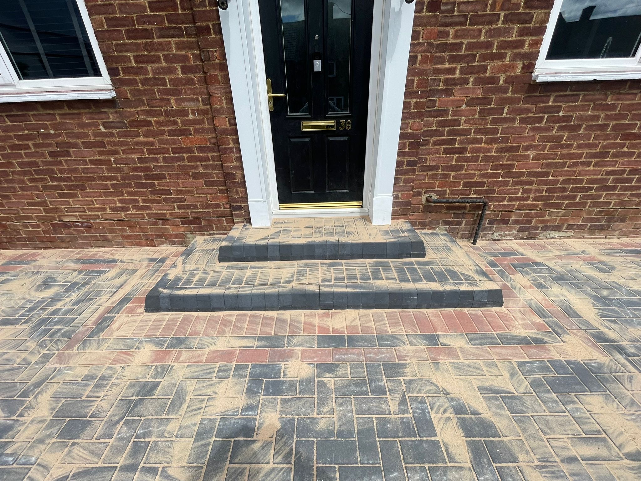 Block-paved front patio & steps