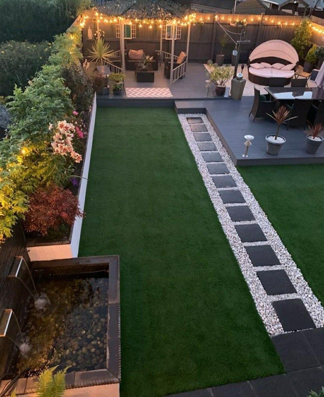 Artificial lawn with lit stepping path